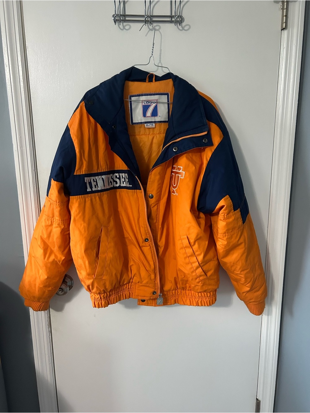 LOGO 7 Orange and Navy Puffer Jacket with Tennessee Logo